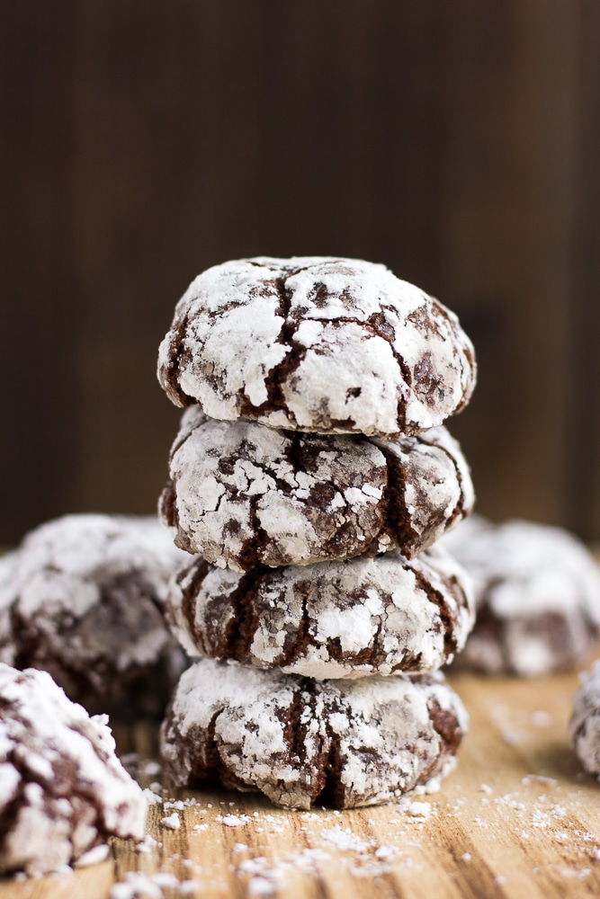 vegan chocolate crinkle cookies in a stack of 4