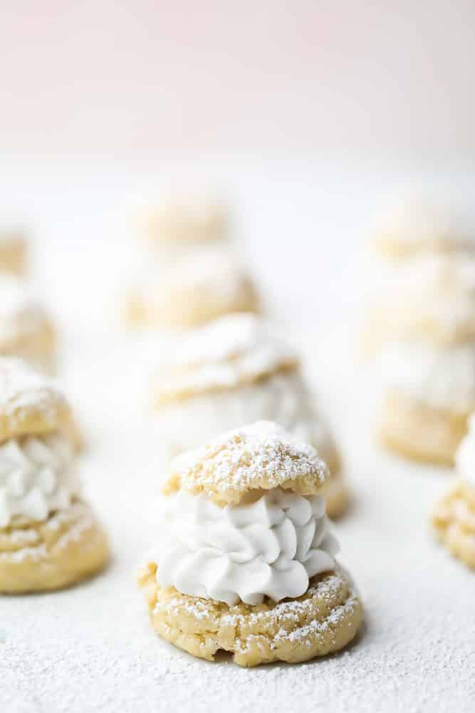 whip cream in choux pastry, pink background