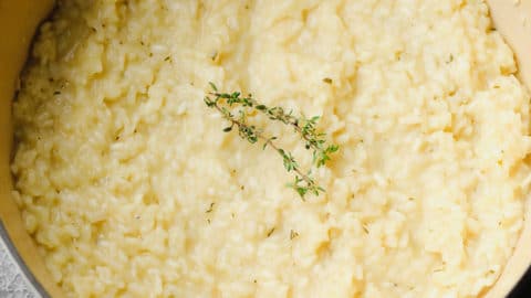 square image of creamy pot of vegan risotto