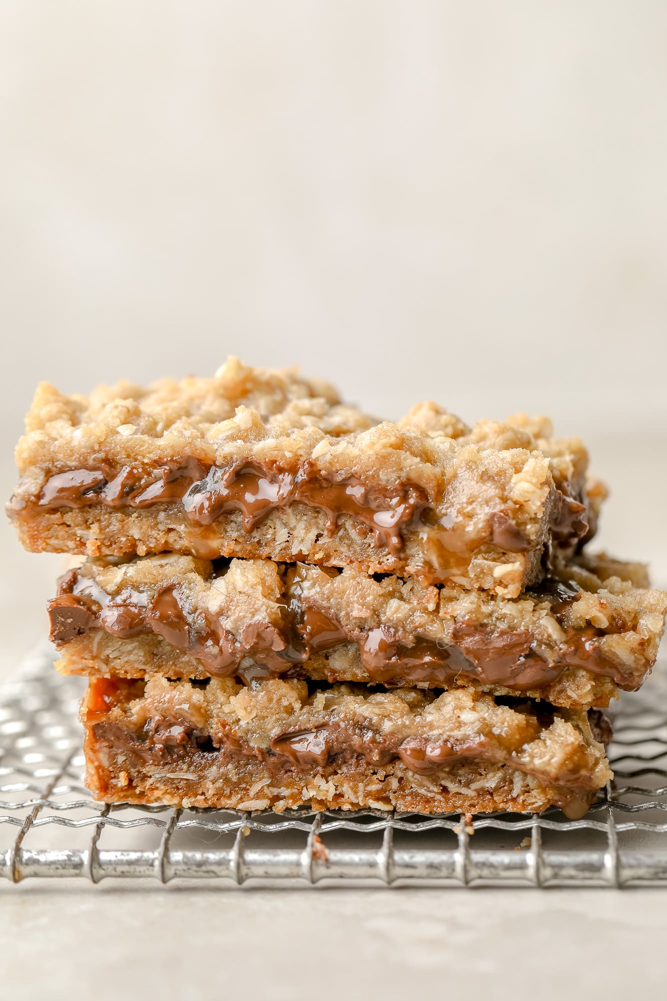 a stack of 3 Vegan Carmelitas on a wire rack.