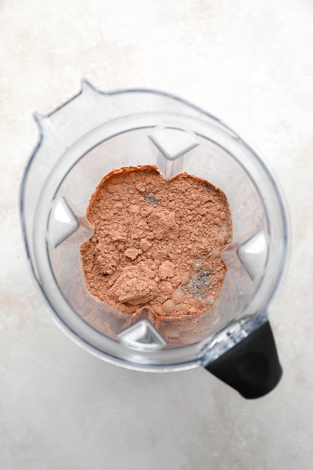 ingredients for chocolate chia pudding in a blender.