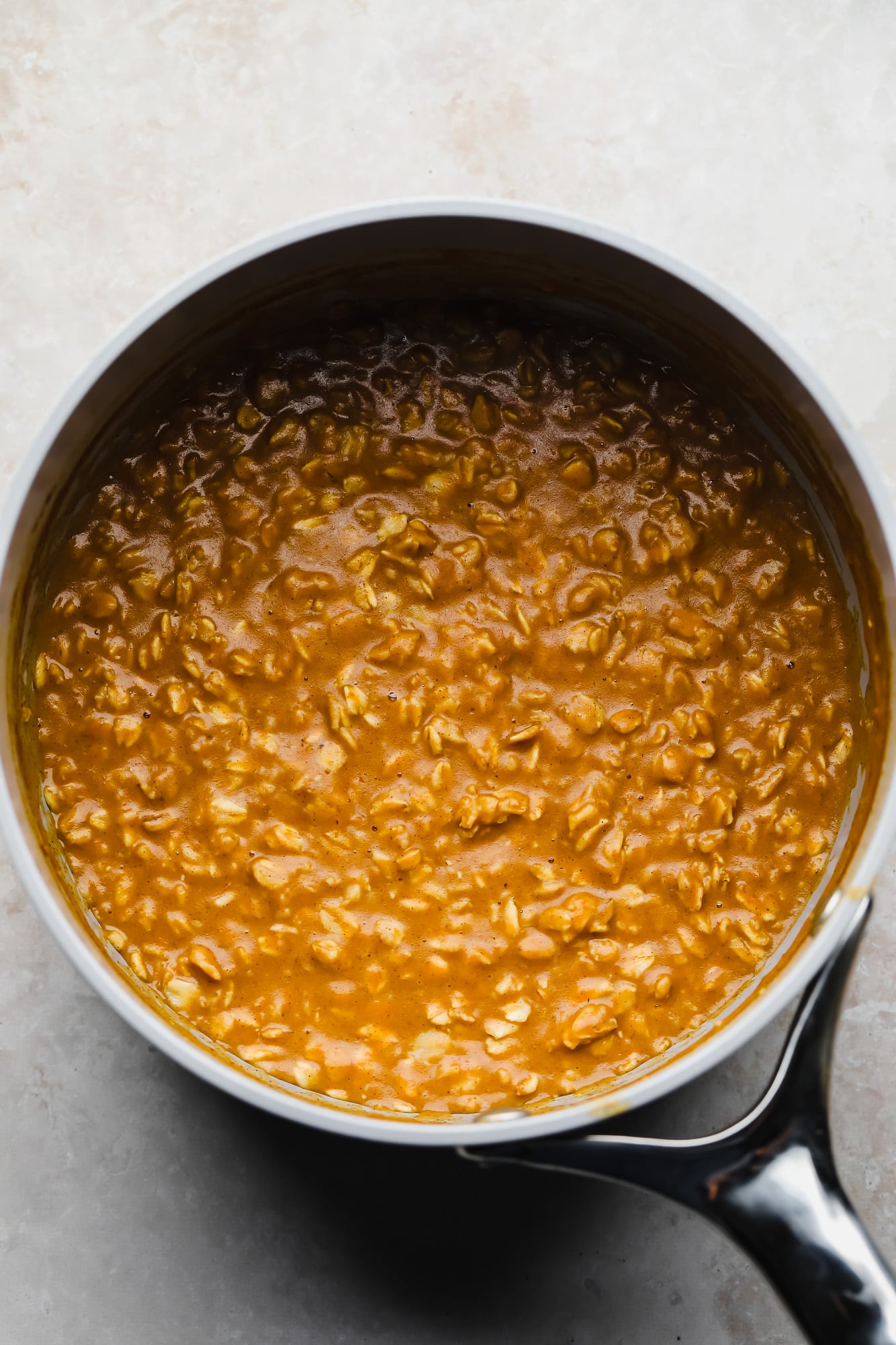 cooking pumpkin oatmeal in a pot.