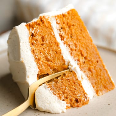 close up on a fork cutting into a slice of Pumpkin Spice Latte Cake.