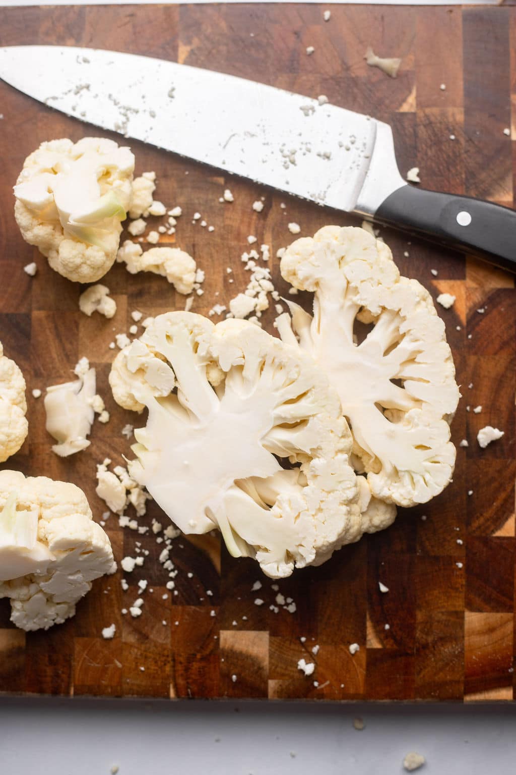 sliced cauliflower on a cutting board