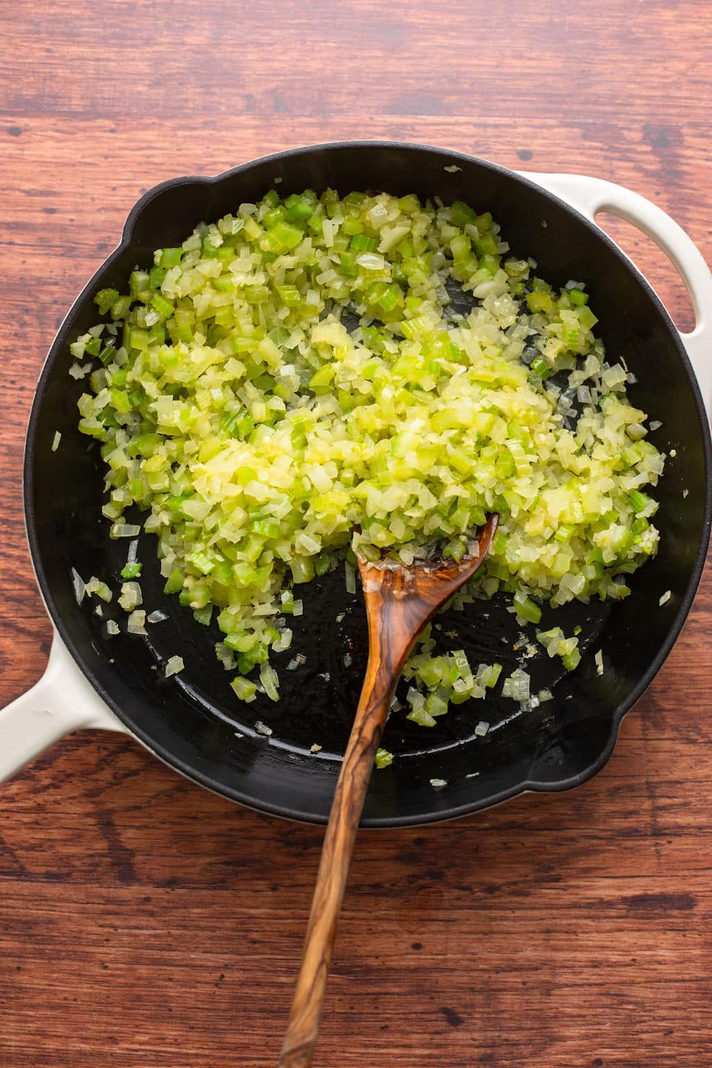 celery onions cooked in a pan