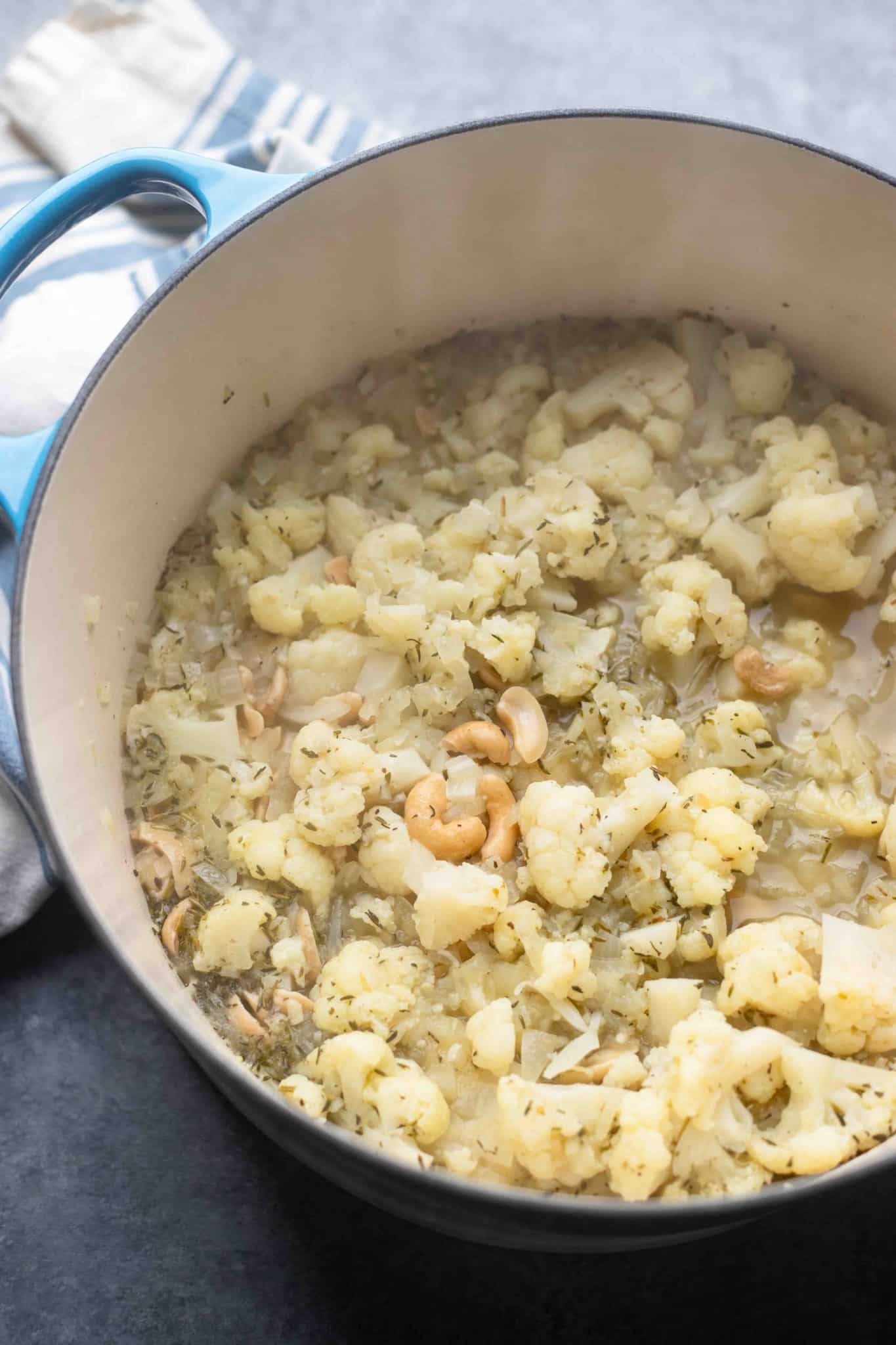 the cooked ingredients for vegan cauliflower soup in a pot.