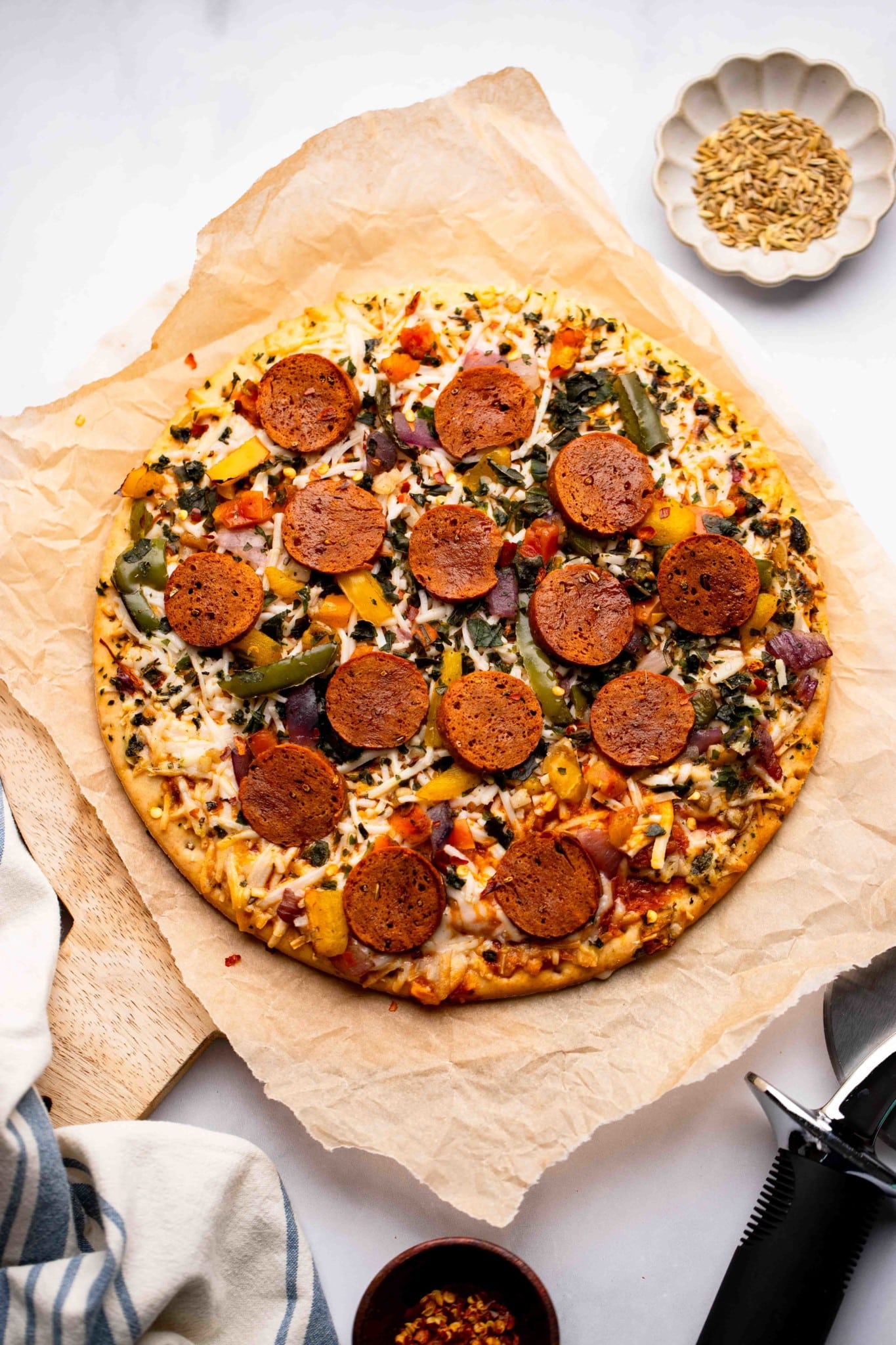 a baked vegan pepperoni pizza.