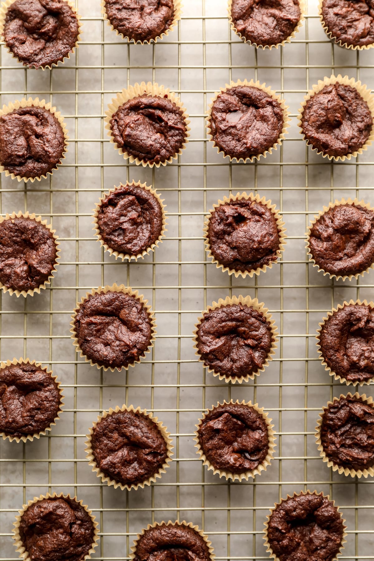 lots of brownie bites on a cooling rack