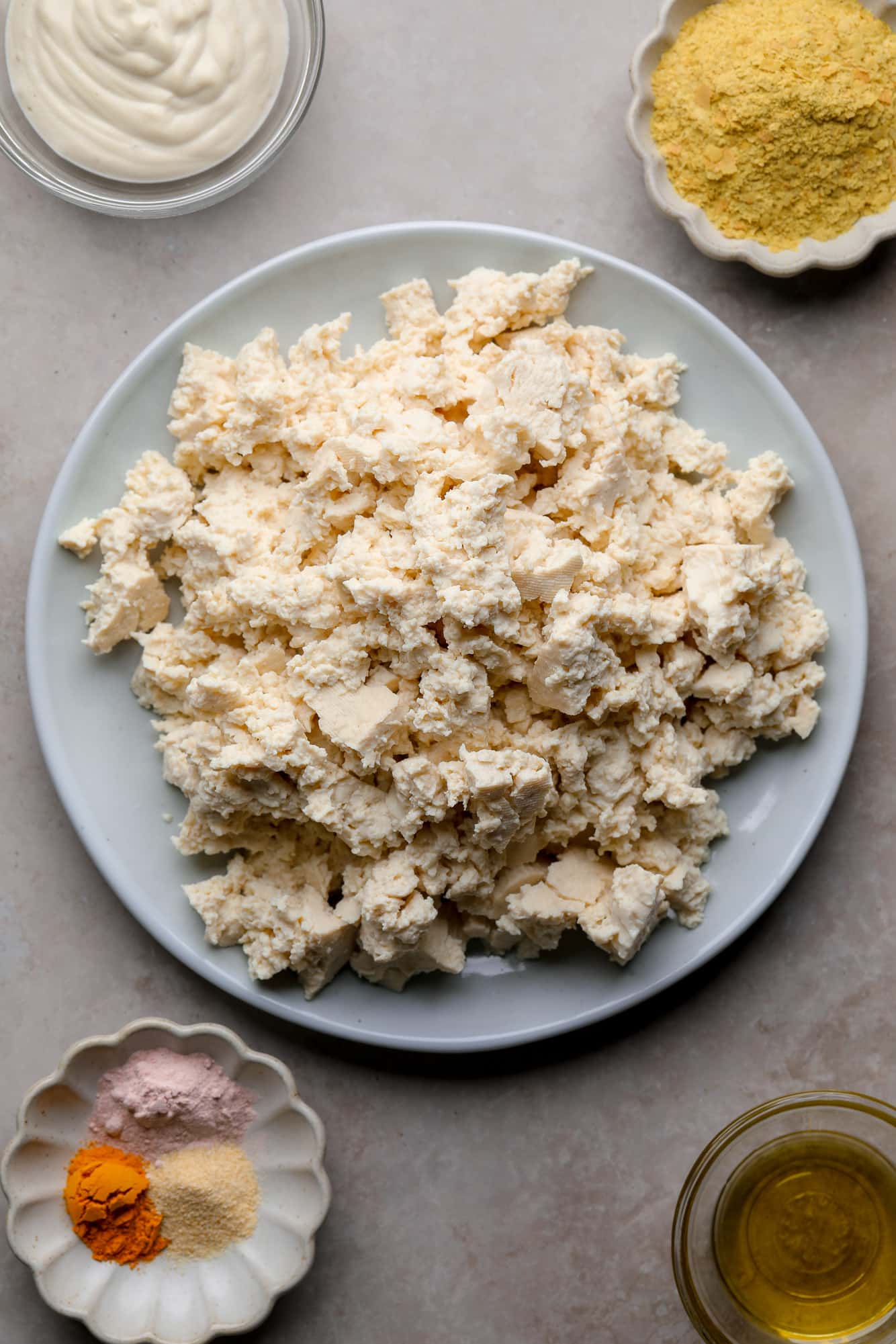 ingredients for tofu scramble on individual plates.