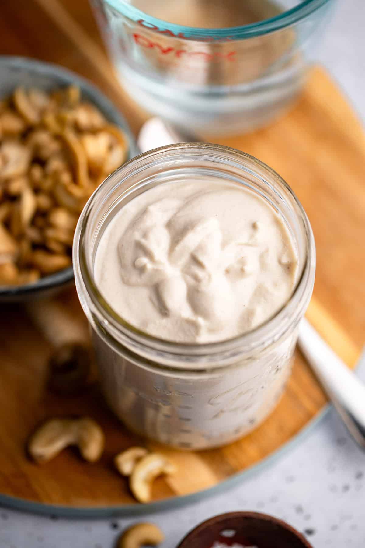 close up on a jar of cashew cream.