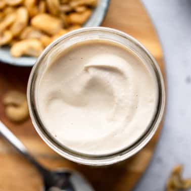 close up on a jar of cashew cream.