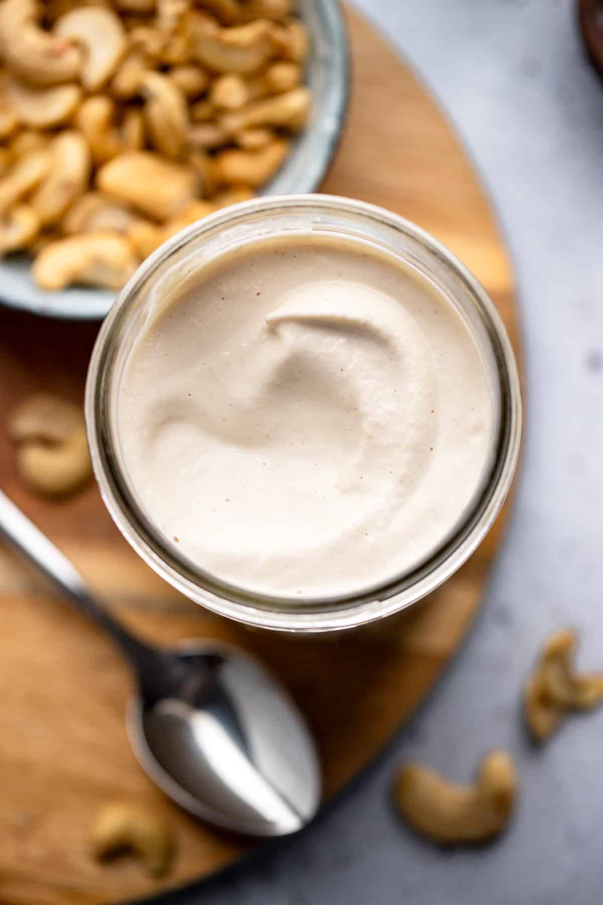 close up on a jar of cashew cream.