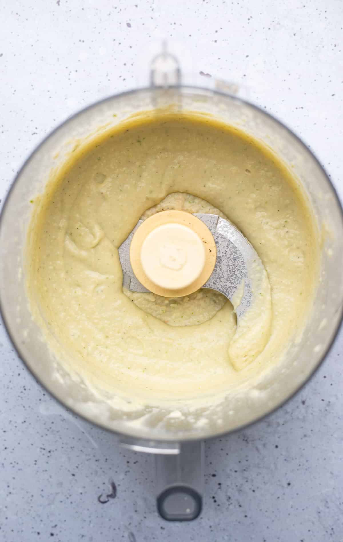 blended white bean dip in a food processor.