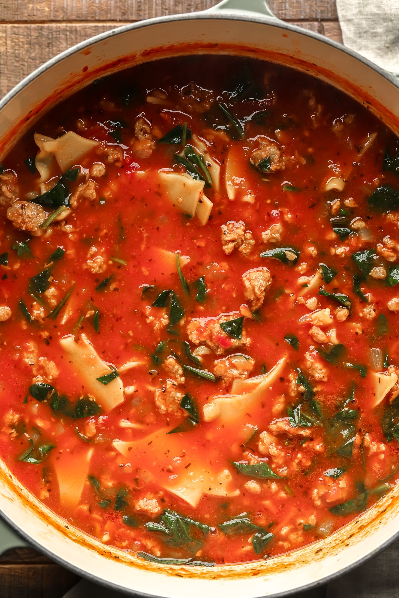 cooking vegan lasagna soup in a large pot.